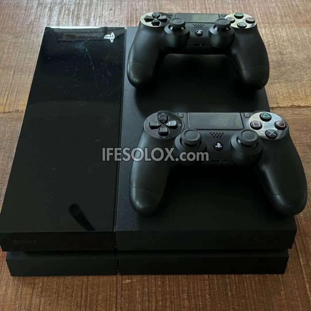 Sony Playstation 4 (PS4) 1TB Game Console with 2 DUALSHOCK 4 Controllers and 10 Games - Foreign Used