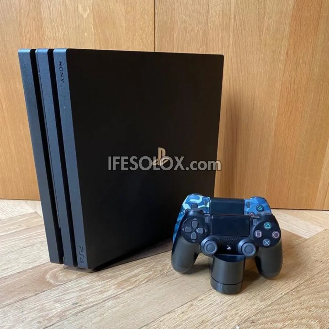 Sony Playstation 4 (PS4) Pro 1TB Game Console with 2 DUALSHOCK 4 Controllers and 10 Games - Foreign Used